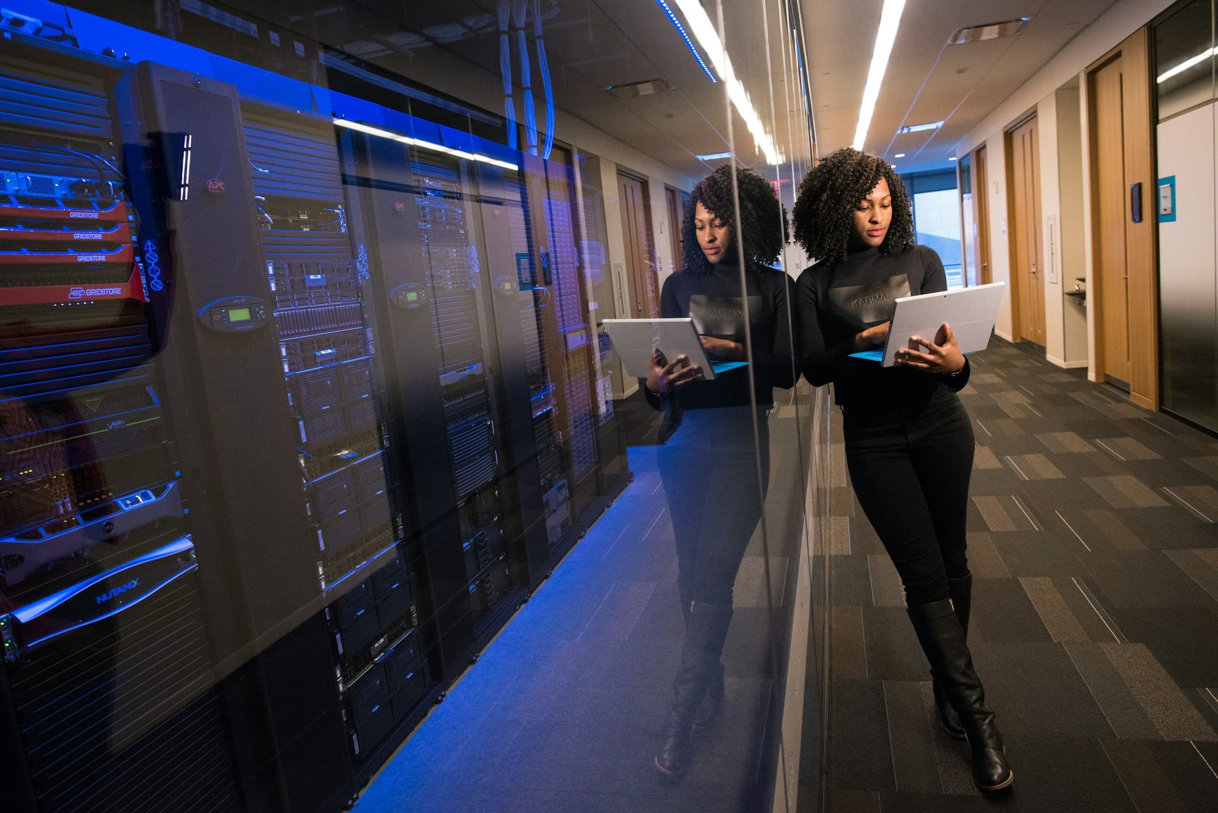 Engineer reviewing infrastructure diagrams on a large monitor